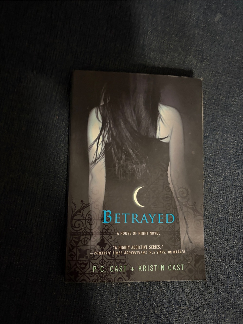 Betrayed by P.C. Cast & Kristin Cast - Black Cover with Turquoise Title